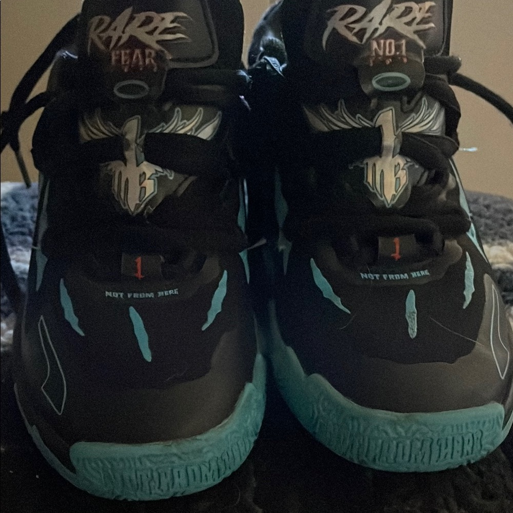 Puma Black and Blue Sneakers with Dynamic Design